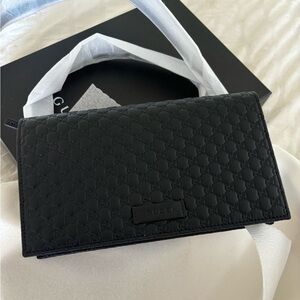 Brand new Gucci clutch crossbody with a box and packaging